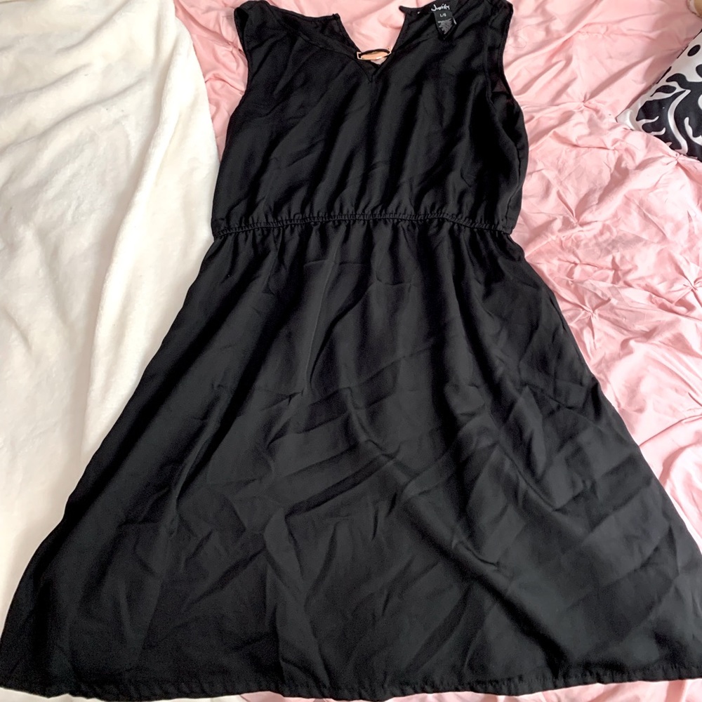 Justify black dress with gold piece